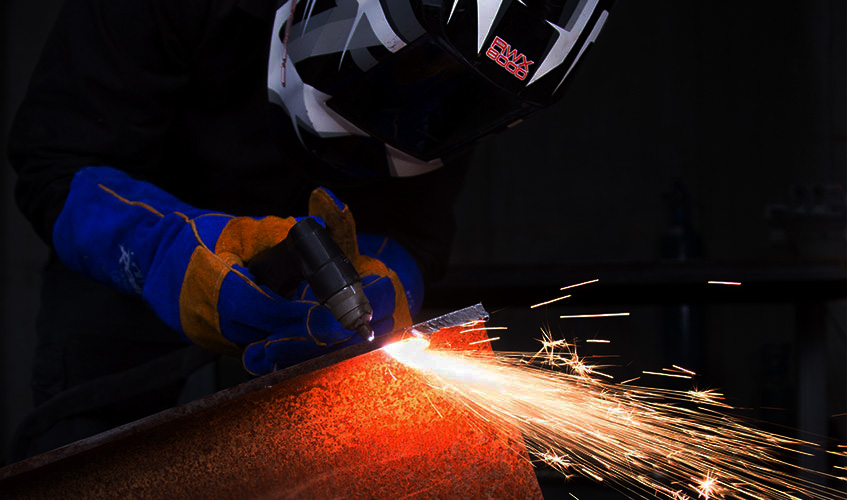Razorweld Vipercut 30i Plasma Cutter - JVPC30iXC12 being used by a welder in a shop