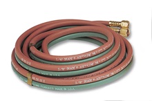20ft 3/16” hose for Miller Smith Medium Duty Outfit CGA510  MB55A-510 20ft 3/16” hose for Miller Smith Medium Duty Outfit CGA510  MB55A-510 durable red and green hose coiled up